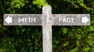 Financial protection myths busted: image shows a sign post with arrows pointing in opposite direction. One is labelled Myth, and the other is labelled Fact.